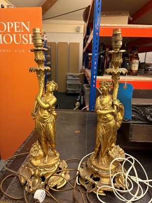 Lot 473 - A pair of gilt metal table lamps
