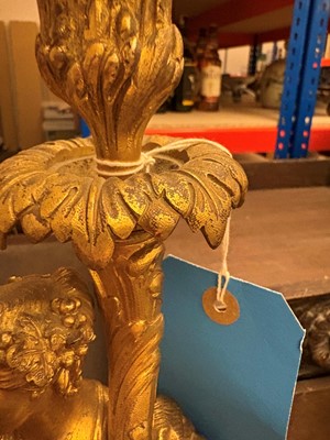 Lot 473 - A pair of gilt metal table lamps
