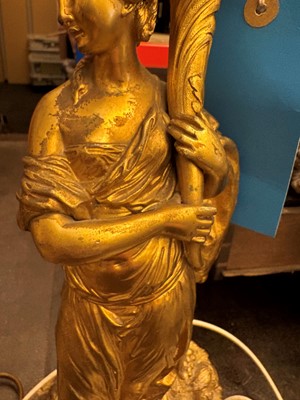 Lot 473 - A pair of gilt metal table lamps