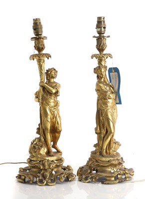 Lot 473 - A pair of gilt metal table lamps