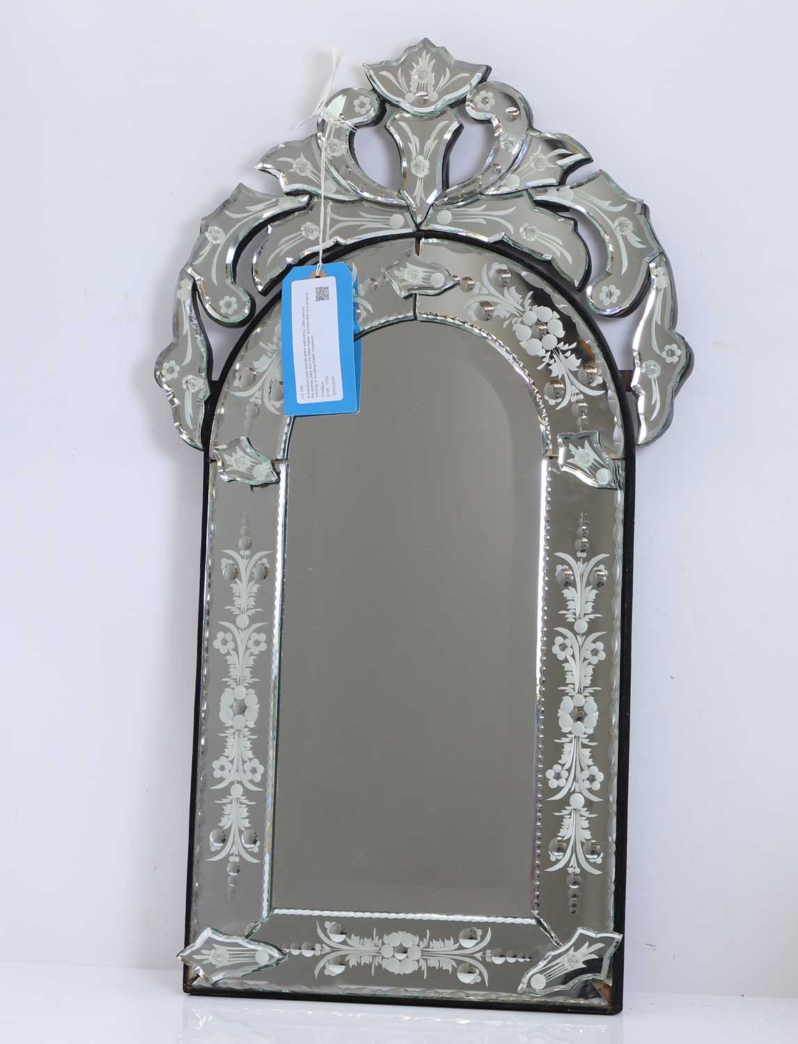 Lot 495 - A Venetian style etched glass wall mirror