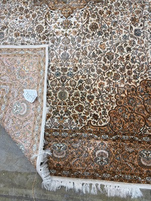 Lot 426 - A Persian design part silk rug