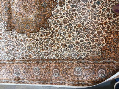 Lot 426 - A Persian design part silk rug