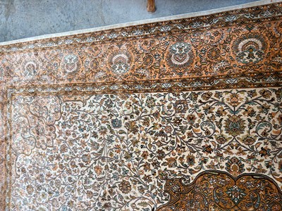 Lot 426 - A Persian design part silk rug