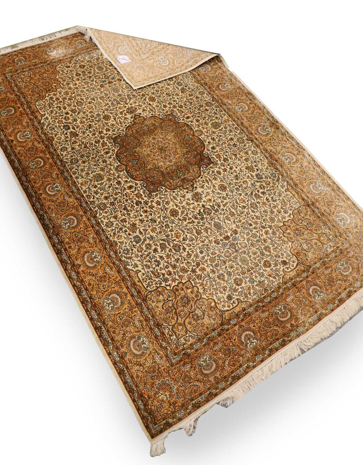 Lot 426 - A Persian design part silk rug
