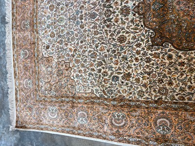 Lot 426 - A Persian design part silk rug