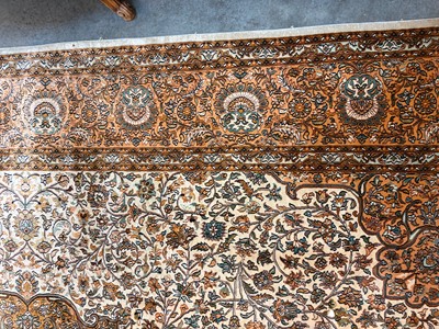 Lot 426 - A Persian design part silk rug