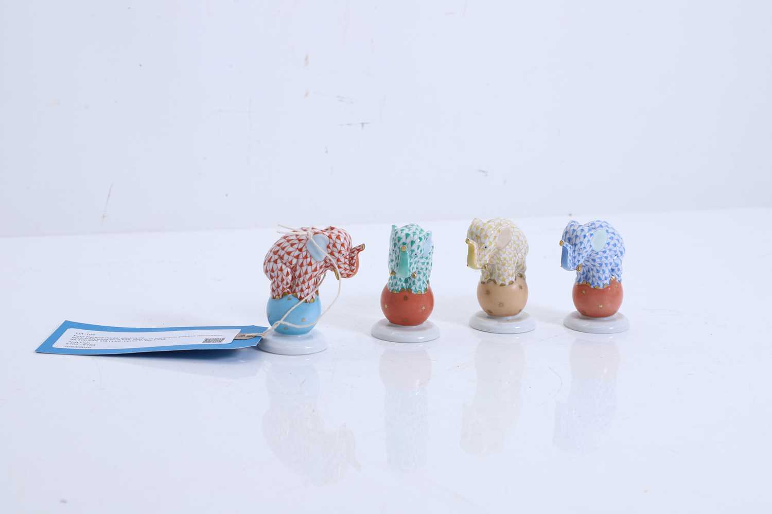Lot 105 - Four Herend model elephants