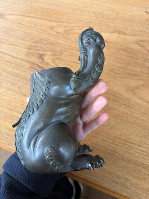 Lot 62 - A Chinese bronze Buddhist lion (shishi) incense burner