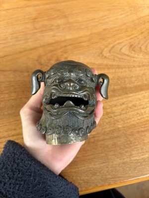 Lot 62 - A Chinese bronze Buddhist lion (shishi) incense burner