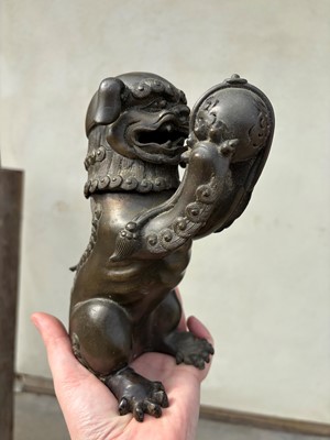 Lot 62 - A Chinese bronze Buddhist lion (shishi) incense burner