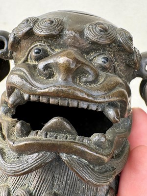 Lot 62 - A Chinese bronze Buddhist lion (shishi) incense burner