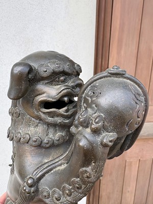Lot 62 - A Chinese bronze Buddhist lion (shishi) incense burner