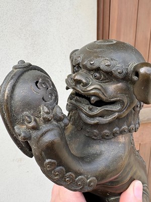 Lot 62 - A Chinese bronze Buddhist lion (shishi) incense burner