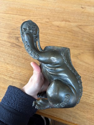 Lot 62 - A Chinese bronze Buddhist lion (shishi) incense burner