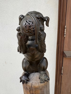 Lot 62 - A Chinese bronze Buddhist lion (shishi) incense burner