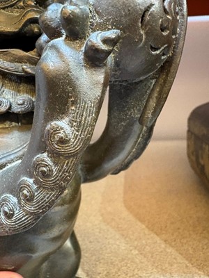 Lot 62 - A Chinese bronze Buddhist lion (shishi) incense burner
