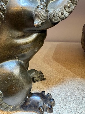 Lot 62 - A Chinese bronze Buddhist lion (shishi) incense burner