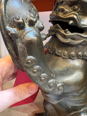 Lot 62 - A Chinese bronze Buddhist lion (shishi) incense burner