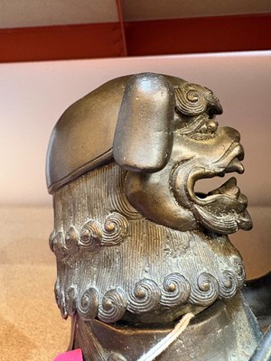 Lot 62 - A Chinese bronze Buddhist lion (shishi) incense burner