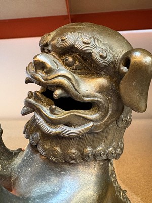 Lot 62 - A Chinese bronze Buddhist lion (shishi) incense burner