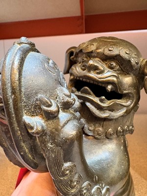 Lot 62 - A Chinese bronze Buddhist lion (shishi) incense burner