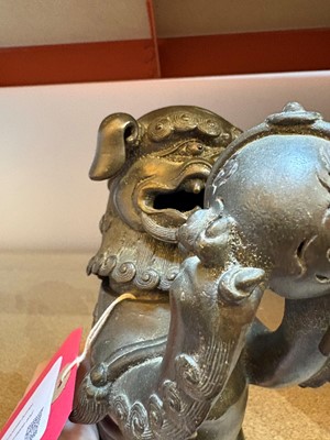 Lot 62 - A Chinese bronze Buddhist lion (shishi) incense burner