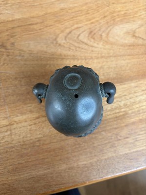 Lot 62 - A Chinese bronze Buddhist lion (shishi) incense burner
