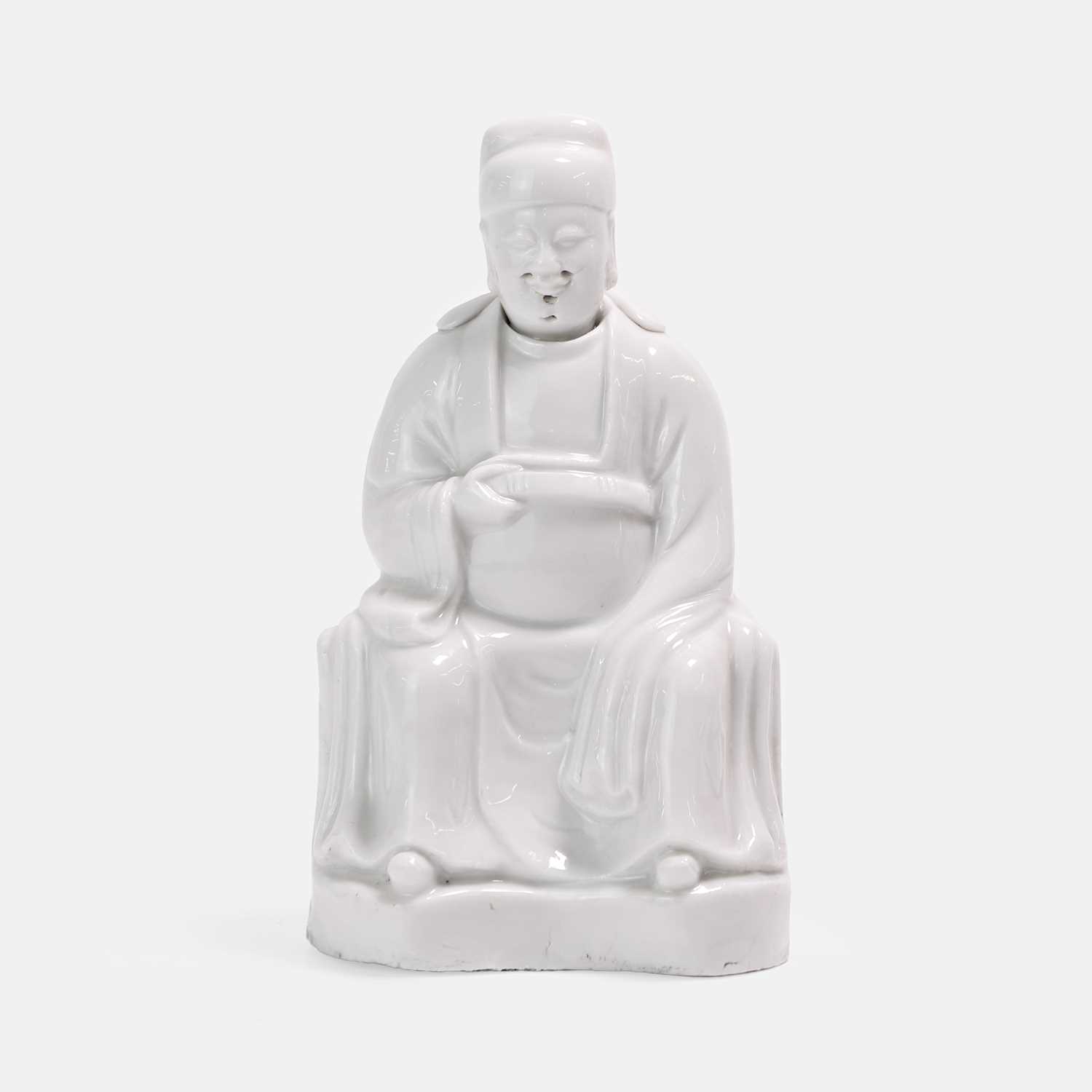 Lot 58 - A Dehua blanc de chine seated figure of Wenchang