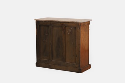 Lot 68 - A George IV-style walnut and parcel-gilt pier cabinet by Gillows