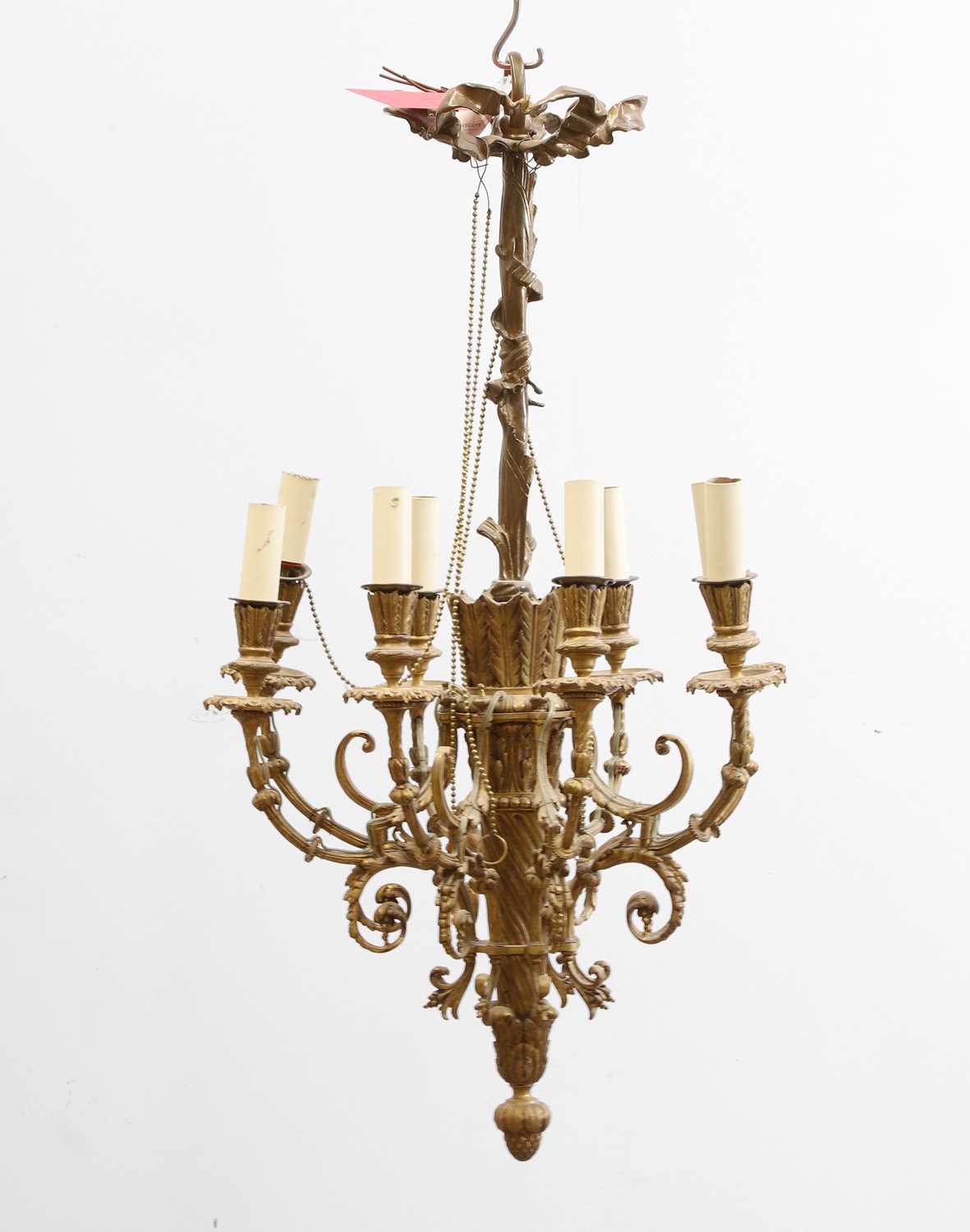 Lot 474 - An eight branch gilt chandelier