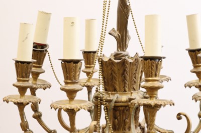 Lot 474 - An eight branch gilt chandelier