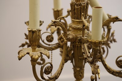 Lot 473 - An six branch gilt metal chandelier