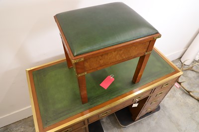 Lot 505 - A mahogany campaign style desk and matching stool