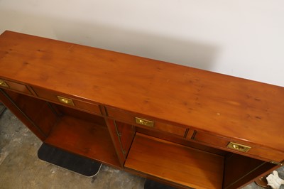 Lot 506 - Two mahogany campaign style open bookcases
