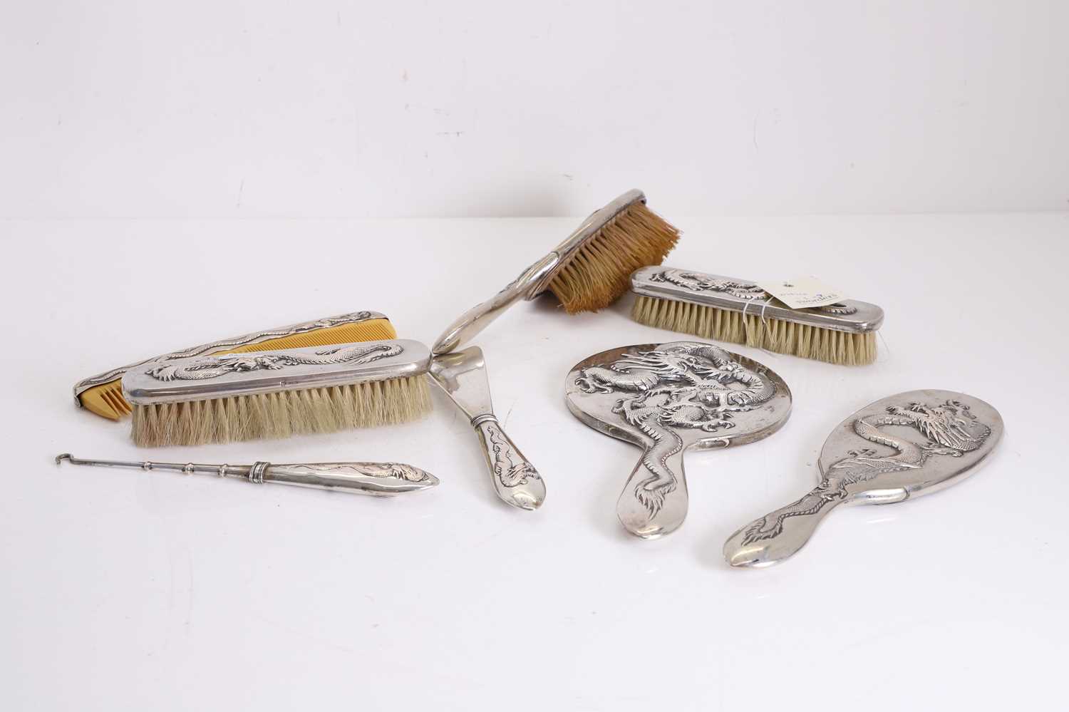 Lot 90 - A Chinese export silver dressing table set
