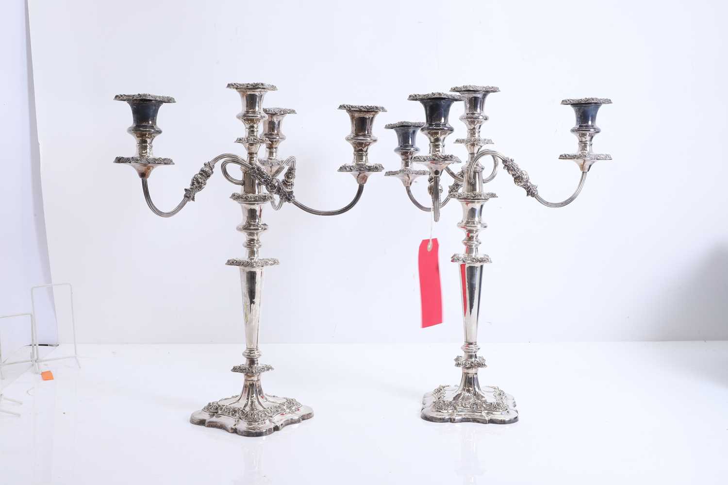 Lot 13 - A pair of silver plated candelabra