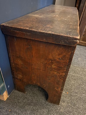 Lot 511 - An elm boarded chest