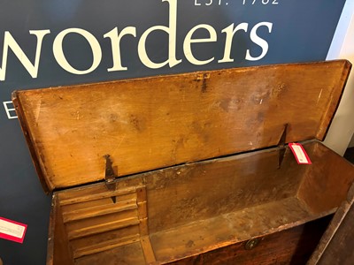 Lot 511 - An elm boarded chest
