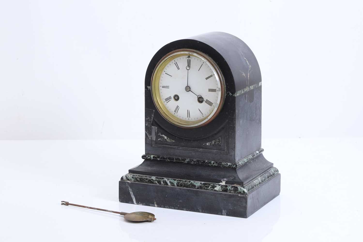 Lot 204 - A small French marble and slate cased mantel clock