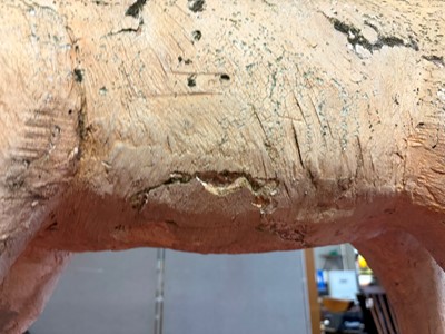 Lot 178 - A painted composition butcher's shop figure