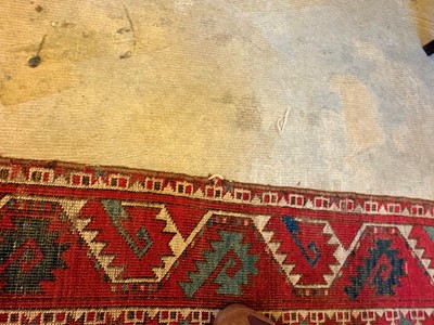 Lot 422 - A large Tekke type carpet