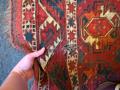 Lot 422 - A large Tekke type carpet