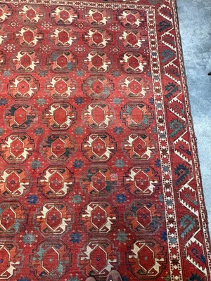 Lot 422 - A large Tekke type carpet