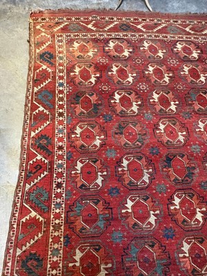 Lot 422 - A large Tekke type carpet