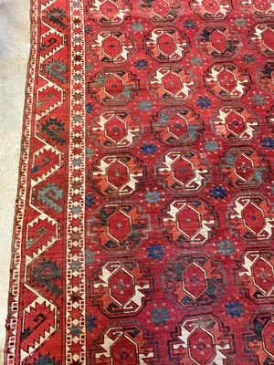 Lot 422 - A large Tekke type carpet