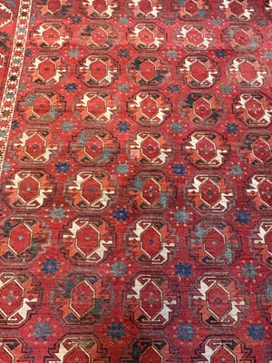 Lot 422 - A large Tekke type carpet