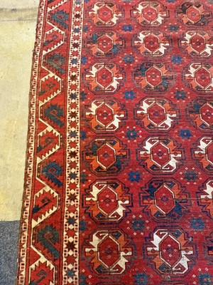 Lot 422 - A large Tekke type carpet