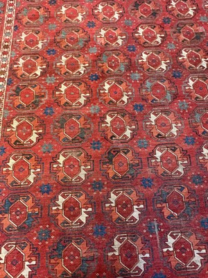 Lot 422 - A large Tekke type carpet