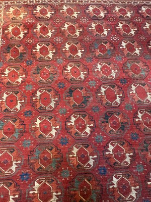 Lot 422 - A large Tekke type carpet